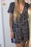 This dress was super cute and long enough on me for being 5'9. Definitely a very thin material which was fine since it was Summer. The front is very low cut though, so might not be appropriate for all occasions. - Maddie