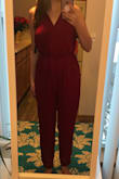 I love this jumpsuit, however, it's loose in the back and looks funny. I usually wear a M in everything, but I am going to return this for a S to see if it fits better. It could be looser in the back because I have a smaller chest size. - Michelle E.