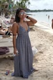 I am obsessed with this dress. It is so light, comfortable, flowy and has pretty yet adjustable straps. I'm usually a medium but after reading the reviews I ordered a small and it is perfect. Perfect length too. I cant wait to wear this dress again. :) - Krystal R.