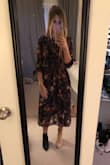I contemplated buying this dress for quite some time. I finally decided to pull the trigger and as gorgeous as it was I unfortunately needed to return it. I didn't realize the models height is 5'9" so when I ordered a Small (being only 5'4") it fell at a really awkward length. I tried to add a belt to shorted it but it just wasn't working. The overall fit otherwise was great for me and the quality was fantastic along with the colors. Just beware shorter girls!! P.S. Don't mind the two different shoes I was really trying to make this look work for me! - Amber J.