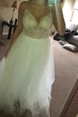 Okay so I kept coming back to this dress and was so scared because I got it on final sale, I ended up ordering and am so happy I did. Measurements were true and the detail on the top is gorgeous! My bust is big so I'll have to find fabric tape to keep the cup a in place but fits! I got it for a beach wedding dress and I'm super excited! - Jasmine M.