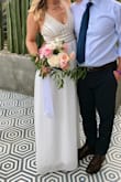 I wore this as a bridesmaid in Mexico (bride requested we wear white). The beading and detail gave it a more sophisticated look while still being flowing and comfortable. Great quality and both the bride and I were beyond happy with the look - Rena T.