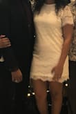 I wore this dress for my civil ceremony. I loved the lace pattern and pretty much everything about this dress. My only complaint is that the dress was a little on the short side. I didn't feel like I could sit or bend over without the dress becoming dangerously short. - Mariah M.