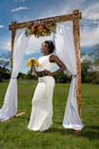 I needed a dress for my wedding. It was a very intimate outside setting so I wanted something simple and elegant. I was anxious to receive the dress because you always hear and see horror stories about ordering online. Well, this dress did not disappoint. It fit like a glove and was the perfect length for my heels. I added a sash just to add a touch of color. I received so many compliments! LOVE this dress! - Erica B.