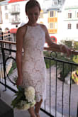 I picked this dress for my wedding day and I couldn't be happier with it. It is beautiful. It fits perfectly, hugging in all the right places, the lace falling just below my knees. No gaps at the arms, the lace is sewn to the liner and has a good quality zipper.  Very pleased. - Sandra S.