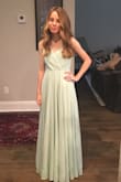 My daughter picked out this dress for her winter formal. We had to make a few alterations because she is tiny but the dress is beautiful! The fabric is flowy and soft. The cut and color is perfect. For the price it is a no brainer. - Christina R.