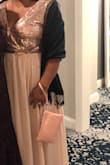 This dress is super comfortable and flattering. I wear a 12 and ordered the XL. It is pretty long and would need to be hemmed if you are on the shorter side. - Sarah O.