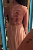 I ordered 2 dresses for a wedding. This is more "dusty rose pink" instead of blush like the description so for that reason I'm returning. The back is really pretty but the top was a little tight for me. - Keilye P.