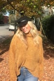 I love this hat and the price point! It was a little snug, but got the job done. - Laurren L.