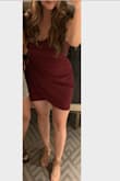 I wore this dress for a ladies night out and I felt amazing in it, which is rare! It fits the chest great- shows just enough to be sexy. It covers the belly perfectly. Short but not too short- I went a size up so it wasn't too "much". I love this dress so much, I bought the longer version to wear for a Holiday party. - Susan G.