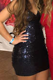 It's very tight and I have a little trouble bending down in it but I was very please that it fit my waist and my hips. My waist is much smaller. I don't have a big bust either and it still fit well, it would be able to fit a bigger bust if needed too. Sequins also stay on fairly well but I have found a couple on my floor. - Karly N.