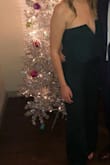 Because I am so tall I've never been able to wear jumpsuits, but this fit so well! I even wore heels with it - they were probably 2.5 inches tall! I got so many compliments on this too! The emerald color was so cute! LOVE! - Brooke B.