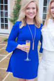 Bought this for a friend's wedding - it is so gorgeous and flattering! The blue is bright and beautiful in person, and the fit is just perfect. Also bought it in the fuchsia shade, which is just as nice. I get compliments every time I wear either one! - Charity M.