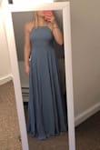 I have a very athletic build and the dress fits nicely! I really like that it is adjustable since I have broad shoulders as well. Looks amazing on and very flattering. Excited to wear it on a cruise! Well made too! - Heather T.