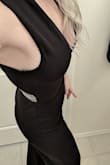I got this for a cold New Year's and plan to wear it with 4-6" heels! It was still about 4-5" too long even with heels on and I had to get it hemmed. I guessed on my hip size but I do have a decent sized booty and it was a tad snug going up over this hips but once it was on it was extremely comfortable. The back fit flattering but the chest, even though I'm a D pushing DD, was not as complimenting as I would have hoped. I suggest wearing stickies with the outfit to keep your chest from looking slack. It is a thicker, classy material and you could go completely nude beneath it and not worry about anything showing if that's your preference. Highly recommend and love it! - Whitney C.