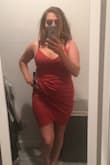 Hot dress!!! Material is stretchy but the dress does run small so size up. I usually wear a small-petite or small but ordered a medium which is snug! Beautiful colors... I ordered black & burnt red. I based my size off of other reviews by weight. - Amy F.