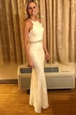 This dress is absolutely beautiful- it's double lined with the beautiful lace overlay. Looks and feels expensive. The only miss is the straps, they are cheaply made but not a huge deal with hair down. Received a ton of compliments, worn for a holiday gala. Added a belt! - Bethany L.
