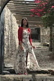 This dress is lovely and great quality! Lulus typically runs a little small for me so I ordered a medium. However this dress I probably could have used a small. I received so many compliments when I wore this in Greece. - Cara A.
