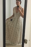 The dress is just like in the picture! The size perfectly fits. The fabric and the sewing are nice. I am so happy that the length is perfect because I'm tall and other dresses are usually either too short or the waistline is too high, but this dress is just perfect! - Eniko P.