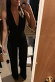 This is my first jumpsuit purchase and I love it! It is very long in length but a nice high pair of pumps is an easy fix. The fabric is great, nice and thick. Can't wait to wear this in Las Vegas! - Sadie B.