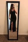 So this dress is so classy! I genetically store my fat on my back so that's kind of sad since it's a little tighter and my back fat says hello to everyone BUT the dress is still so classy yet sassy. The slit is actually in the middle, NOT the side. I thought it would be on the side but it's seriously straight down the middle. It's super comfortable! I'm wearing it to my work holiday party and it's perfect. - Katheryn P.