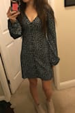 It fits true to size. It's really cute! - Kelly B.