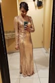 The sequins kept getting caught between my arm and waist, but it was worth the price! The light caught it just right every time. Suggest sticky tape if you wear a strapless bra. And a broom to pick up all the sequins that fall off. - Aiesha L.