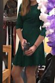 You wouldn't expect this material when looking at the picture, but it is nice quality! The dress was the perfect length! It also made my waist look tiny! The waist line sits right above my "love handles" and hides them completely. Would highly recommend! - Maggie I.