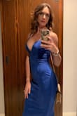 I love this dress!! I love it so much, I ordered it in black also. It is so soft to the touch. I love the way it hugs curves in a very flattering way while still being very comfortable to where. I did not want to rake it off at the end of the night. - Amanda M.