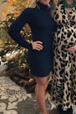Received so many compliments on this dress! So cute I love the sleeves and higher neck. It was a little too short for my liking I wish it was a little longer. - Kendra T.