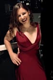 I'm 5'3" ft, 5'5" when wearing heels. The S sized dress was a little bit too long for me even when on heels. But the material and color are so nice!! I had no problems figuring out how to wear it - there are plenty of pictures in the search once you google "convertible dress". The waist of the dress is a little bit tricky when it gets to taking it off (there is no zip) but it's not a big problem after all. I got a lot of compliments that evening, gonna wear it again. - Liza C.