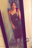 I got this dress for my company's Christmas party and I loved it. Fit perfectly, can be worn with or without a bra. I got a ton of compliments. Just to note, I did think this dress had a slit, it's actually more like a wrap, but still super cute - Meredith B.