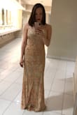 I wore this dress to a company Christmas party and got so many compliments! It was comfortable and I could wear a regular bra with it which is a must for me. Please do know that if you are short like me you will need very tall heels in order to not trip over the dress all night; I am wearing 5" heels in the photo. - Rebecca R.