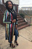I wore the dress open with jeans and a shirt underneath because it was cold outside. I received compliments all night! It runs a little small, but it feels great. It's a nice material for the winter, pretty heavy with all the sequins. Quality and definitely not cheap looking like some sequin items. - Chantal A.