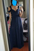 The dress fit my torso perfectly! I have trouble finding dresses that are small enough to fit my torso area, but I was surprised this one was a perfect fit. Only problem is the dress is really long. I got it tailored to fix the height on the dress, which is an easy fix. I think the dress would be perfect on someone 5'5" or 5'6". - Priscilla C.