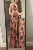Fit me perfectly in the waist/hips but is HUGE in the upper section. I thought the model looked small on top like me, so I thought for sure it would fit, but it was really big. I altered it on my own which looked a little weird, but I didn't have time to find another dress. - Kelsey A.
