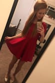 Love it !!! Ordered this for a Christmas party and think I'm going to wear it for new years too. The color is perfect, bold but not over the top. The length is flirty but you don't have to keep pulling it down all night. - Claire U.