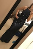 Dress looks beautiful! Fits like a glove. The dress is not itchy, but the sequins do rub on your arms. Not the most comfortable thing because of how tight it is but with a fit like that it's worth it! - Clare G.