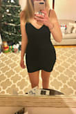 This dress is amazing. I never in a million years would I have thought this dress would look good on me. It hugs in all the right places and the material in the front is so forgiving in the stomach area! I think it fits true to size, it is a body con dress so it is fitted - I would say if you want it a little looser like some of the photos, size up. I am super tall and the dress is a tad shorter than I would like, but I am just going to throw on some tights when I wear it. If you're on fence, just buy it!! - Morgan C.