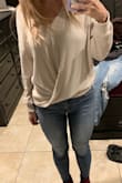 This top is very nice. A little big but not enough to exchange. It's very comfy and you can dress it up or down. Love the front! - Emily G.
