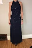 I bought this dress for a work Christmas party. It hugs in all the right places while allowing you to breathe. Perfect for the dance floor!. No alterations were needed.  So pleased with this dress. - Sandra S.
