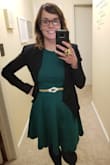I ordered a medium because I like to make sure my dresses are long enough to squat with my three kids. That's the only reason it was a bit large. I added the gold belt and accessories to break up the green. Perfect dress for the holidays! - Amanda M.