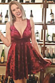 I wore this for a holiday party and received numerous compliments. I ordered a large since I live abroad and was afraid it might be too small, but a medium would have been better. I just pinned it in the back and it fit great! - Amber Y.