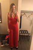 Being 6ft, finding jumpsuits is a little tricky. They either ride up in the front or are too short in the legs. This jumpsuit fit perfectly as far as length. I even ordered 4 inch heels to wear with it and it still looked perfect length wise. I wish I had ordered a medium just so it fit me a little tighter, but that's completely on me and how I prefer my clothes to fit. It was a last minute outfit for a Christmas concert in Nashville. I needed something that looked fun and fancy that would work for both a concert that I wanted to dress fancy for and hitting the bars on Broadway. I was SO comfortable all night. 

I will definitely be trying more jumpsuits from Lulus. - Jenna F.