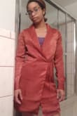 So I tried this on and the color is fair, more of a neutral on me which is what I expected, but it just reminds me of a bathrobe. The material has a nice satin material with a shimmer, but overall I think with the collar it just didn't work. Be aware of the arms they are tight, you wouldn't be able to raise your arms over your head without it ripping or having the chest area fly completely open. Will return. - Mara D.