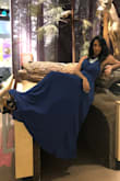 It was so flowy and fun. Definitely if you're on the shorter side you'll need heels or to get it altered height wise. I got so many compliments on it and you just need to accessorize right. The game is in showing off the back though. - Ayushi A.