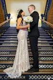 I ordered this dress for my court wedding that I was five months pregnant. I normally wear a small, but I ordered a medium to accommodate my bump. I hemmed the bottom a little and got the straps changed . . Over all the dress was perfect and I would highly recommend. - Briana M.