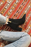 I have been looking for a good black bootie for so long and I love these! Goes perfectly with jeans or dresses! After reading other reviews, I went a half size down and they fit perfectly! Love them! - Erin W.