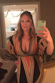 Ordered a medium and it fit perfectly. Typical tall girl problem is that it didn't touch the floor (for a maxi dress) but it still looked great. I wore it to a themed 70's holiday party but will definitely wear this for other events or my next beach vacation! I received tons of compliments. Not for those bashful about showing cleavage. Deep plunge bra and a little duct tape kept everything in place. - Katherine M.