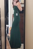 Hey girl hey, you need this dress! I wore to a black tie Christmas party and got compliments all night. The front is sleek and hugged my curves and the exposed back was so sexy! I cant wait to wear it again. Also the back isn't too low so you can still wear your high waisted spanx, and I wore a sticky bra to boost the girls. - Katie F.